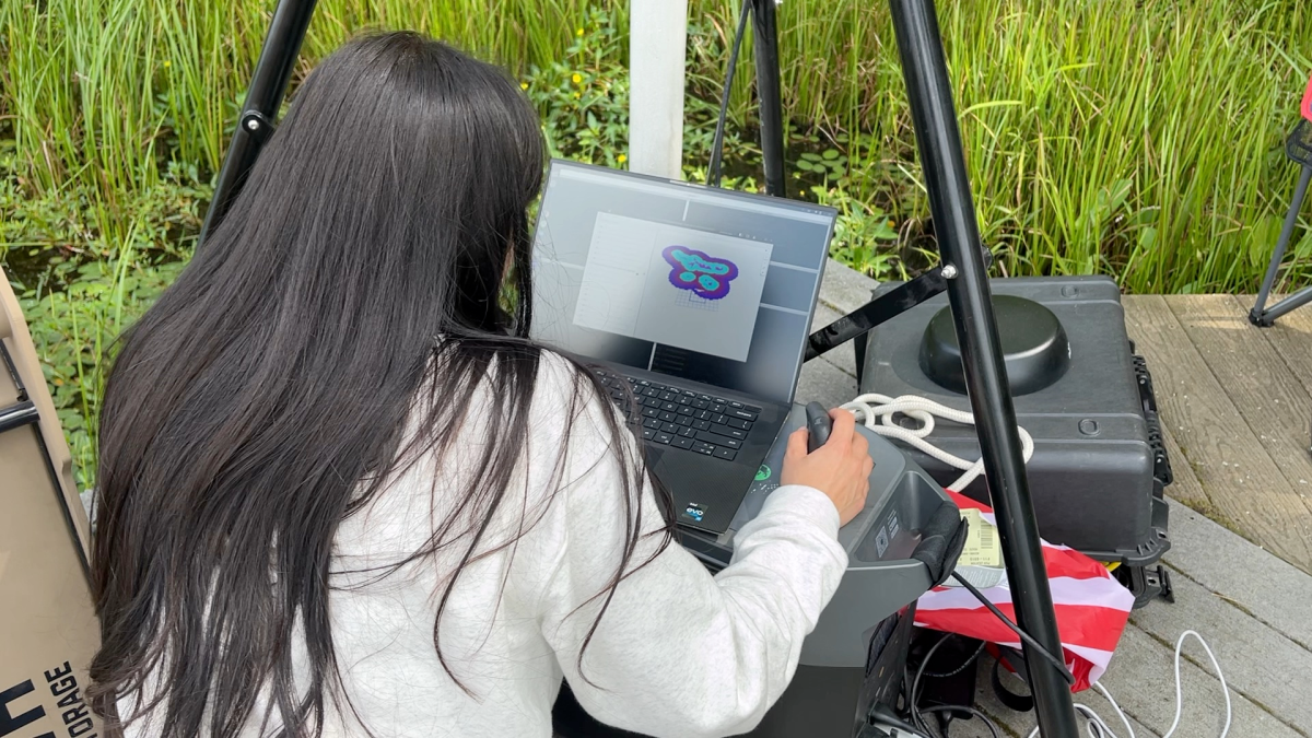 A Polymath Robotics engineer using Foxglove in the field.