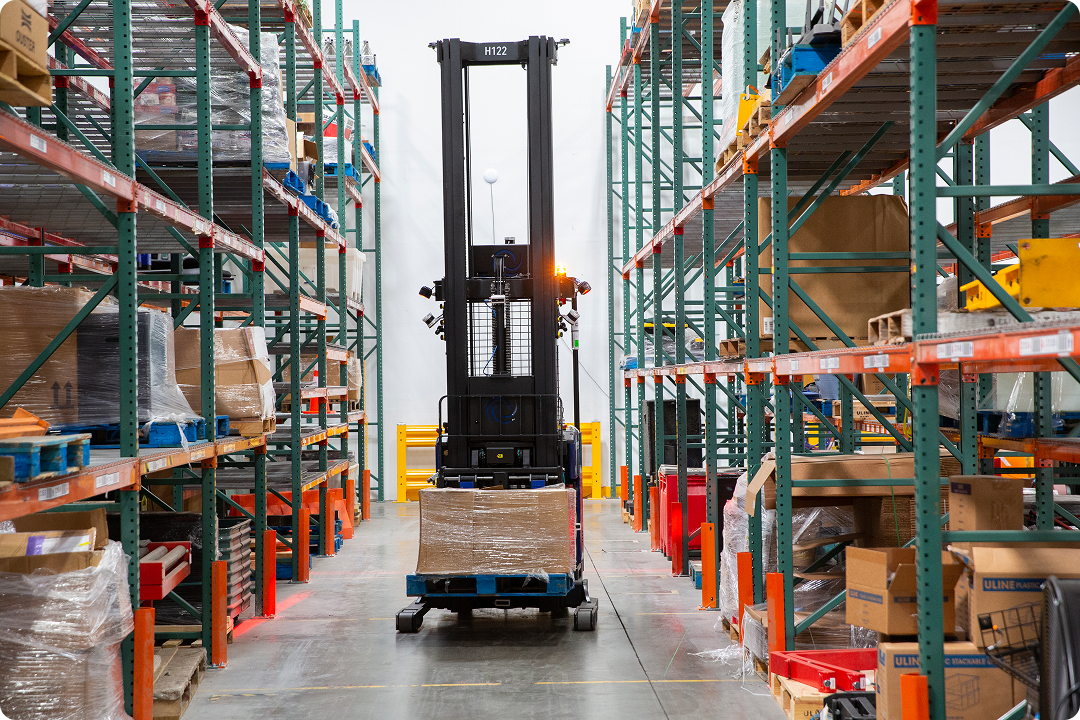 A Third Wave Automation robot operating autonomously in a warehouse.