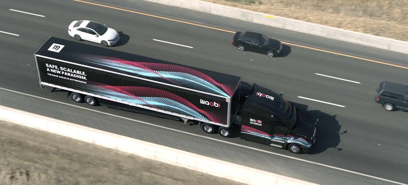 A Waabi truck on a highway.