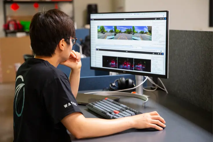 A Wayve engineer using Foxglove.